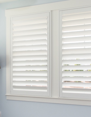 Plantation shutters with hidden tilt rods in Hartford